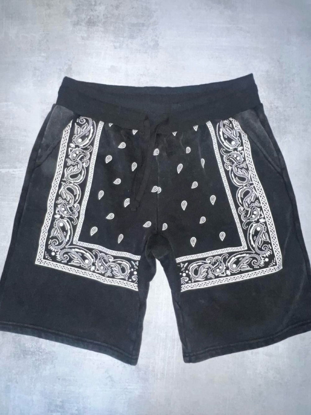 Fashion Nova black shorts with white paisley bandana print
